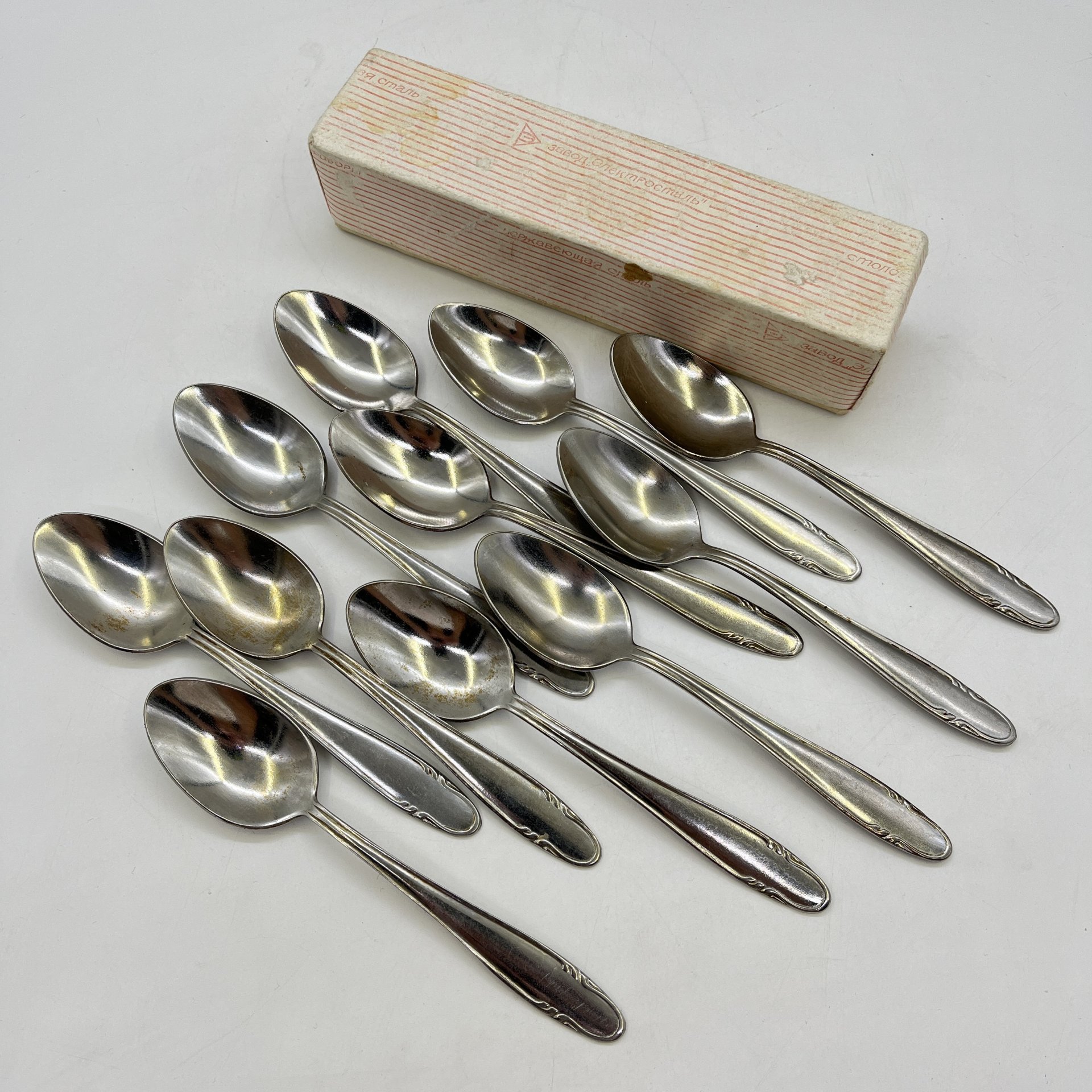 Набор из 11-ти чайных ложек с флоральным декором, завод "Серп и Молот", нержавеющая сталь, СССР, 1970-1990 гг.