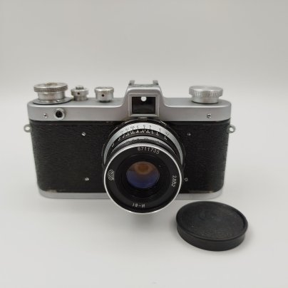 Фотоаппарат "Заря" с объективом "Индустар-61" в родном кофре, металл, кожа, стекло, полимерные материалы, Харьковский машиностроительный завод им. Дзержинского (ФЭД), СССР, 1959-1961 гг.