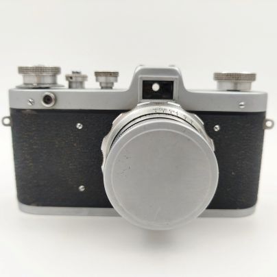 Фотоаппарат "Заря" с объективом "Индустар-26м", пластик, металл, стекло, Харьковский машиностроительный завод им. Дзержинского (ФЭД), СССР, 1959-1961 гг.