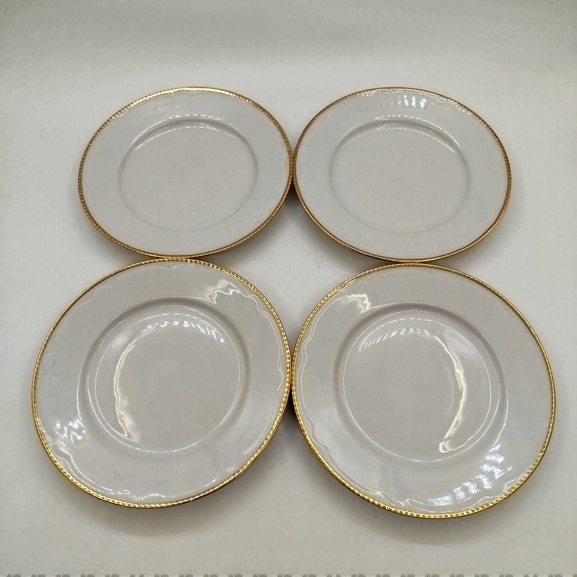 Набор из четырех десертных тарелок, фарфор, Минский фарфорово-фаянсовый завод, СССР, 1968-1983 гг.