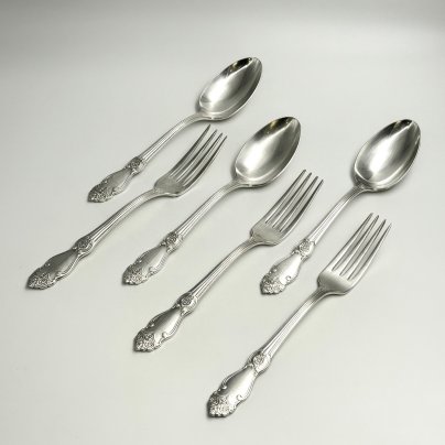 Набор столовых приборов на 3 персоны "Серебряная роза" (3 вилки и 3 ложки), мНЦ (медь-никель-цинк), Кольчугинский завод цветных металлов, СССР, 1970-1990 гг.