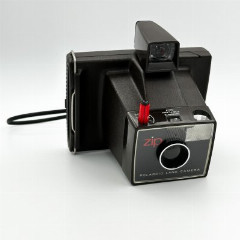 Фотоаппарат "Polaroid Land Camera Zip" с инструкцией, пластик, бумага, печать, США, 1974-1977 гг.