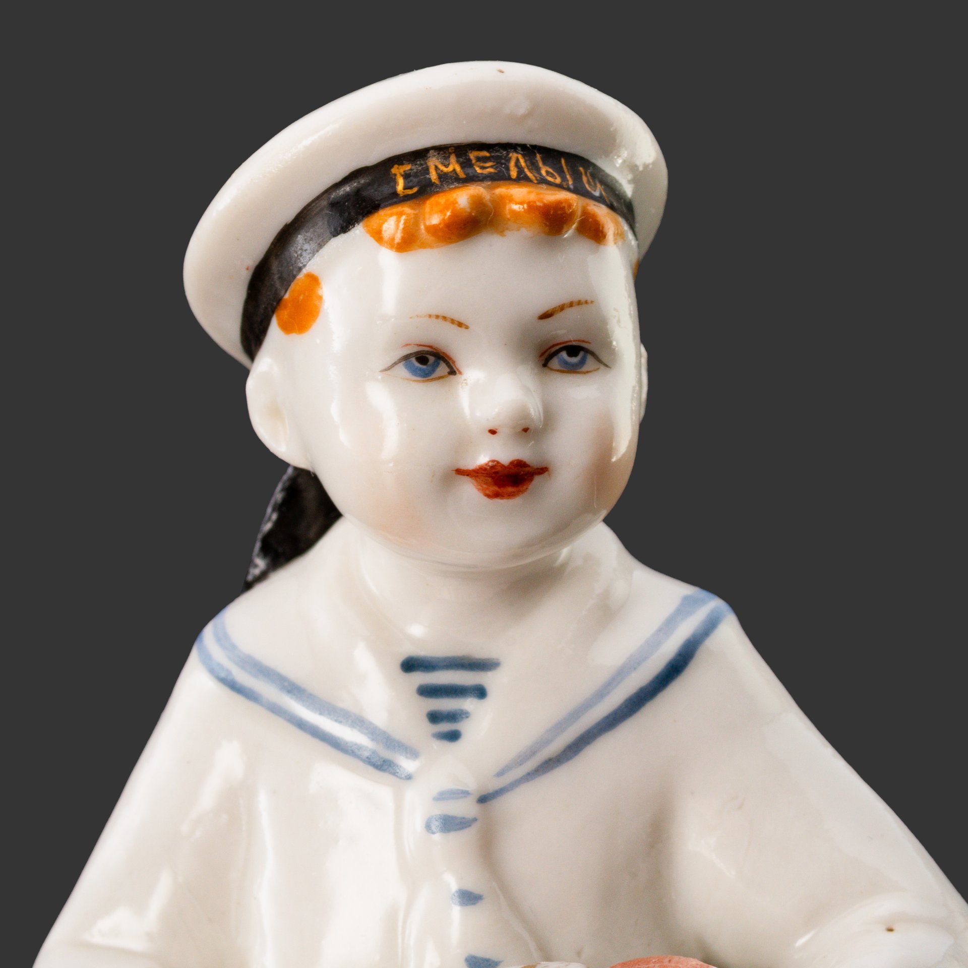 Статуэтка "Юный гармонист" (Морячок), скульптор Г.С. Столбова, художник Е.Н. Лупанова, фарфор, роспись, золочение, Ленинградский фарфоровый завод (ЛФЗ), СССР, 1960-1969 гг.