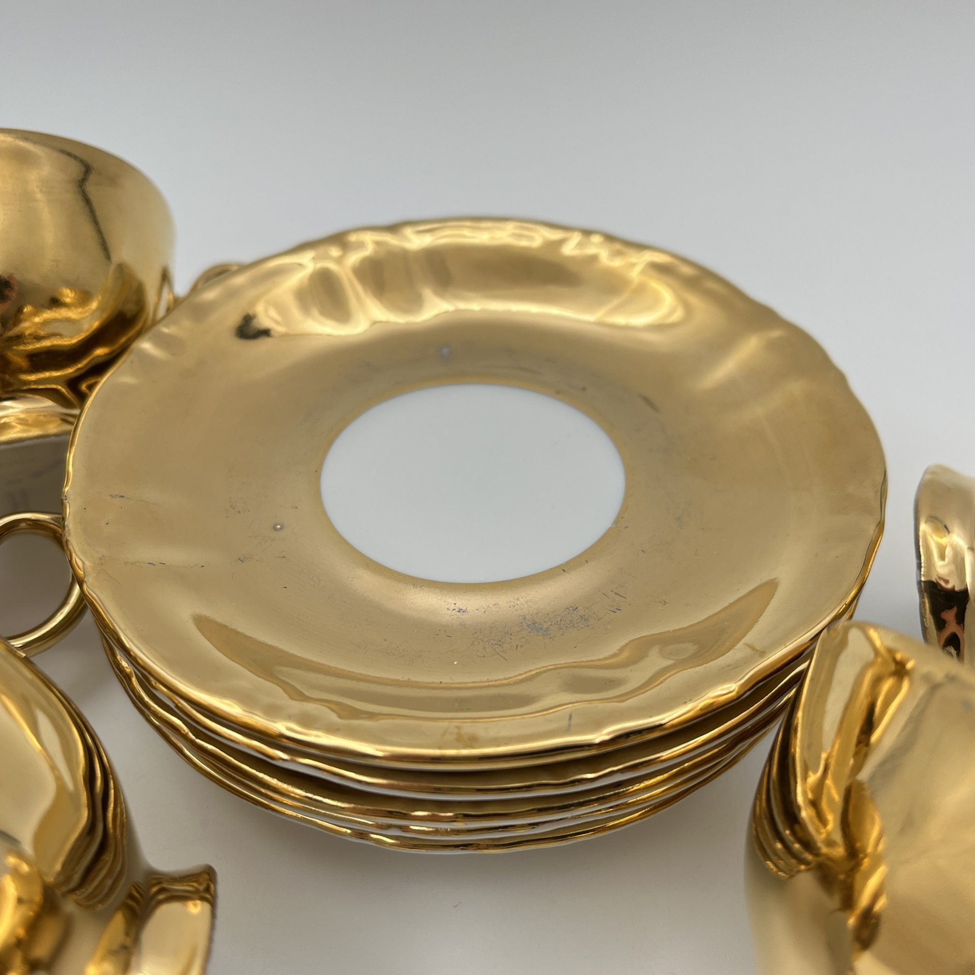 Сервиз кофейный золотого цвета на 5 персон (12 предметов), фарфор, золочение, Kahla, ГДР, 1968-1987 гг.