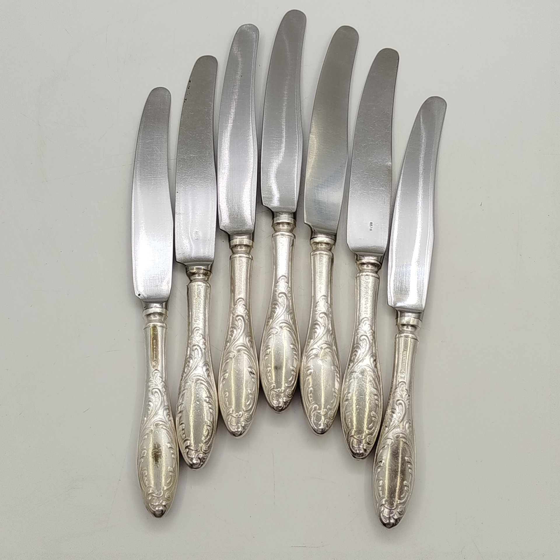 Набор из семи закусочных/десертных ножей "Пламя", мНЦ (медь-никель-цинк), сталь, Кольчугинский завод цветных металлов, СССР, 1960-1980 гг.