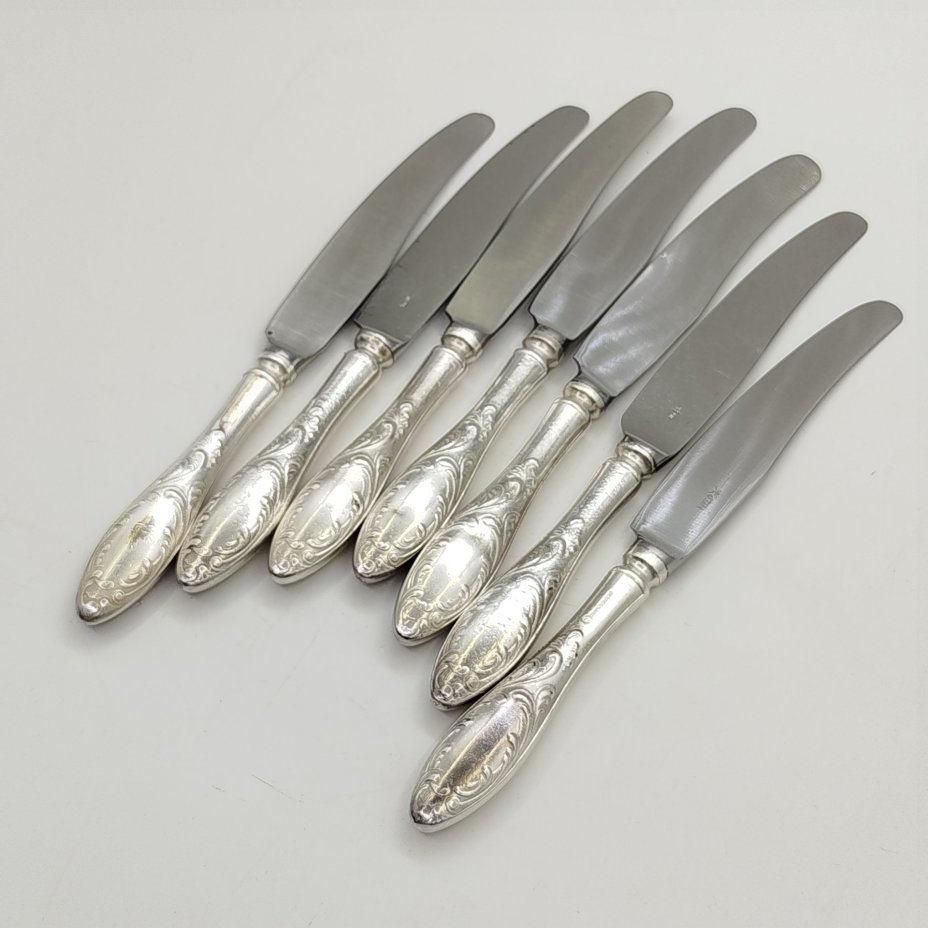 Набор из семи закусочных/десертных ножей "Пламя", мНЦ (медь-никель-цинк), сталь, Кольчугинский завод цветных металлов, СССР, 1960-1980 гг.