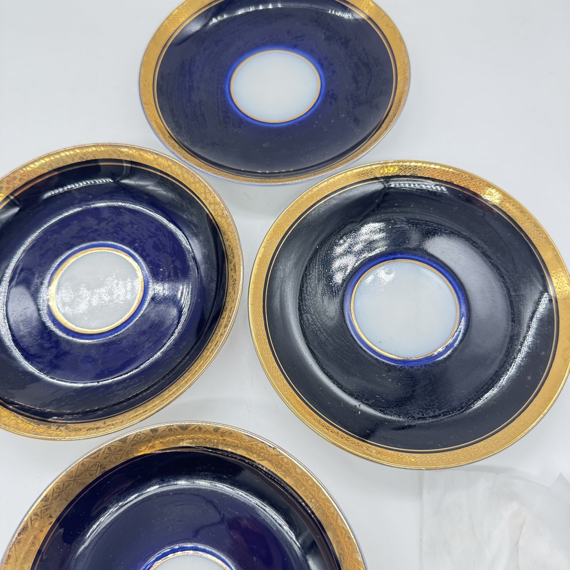 Набор из 4 блюдец с растительным декором (в подборе), Ленинградский фарфоровый завод (ЛФЗ)