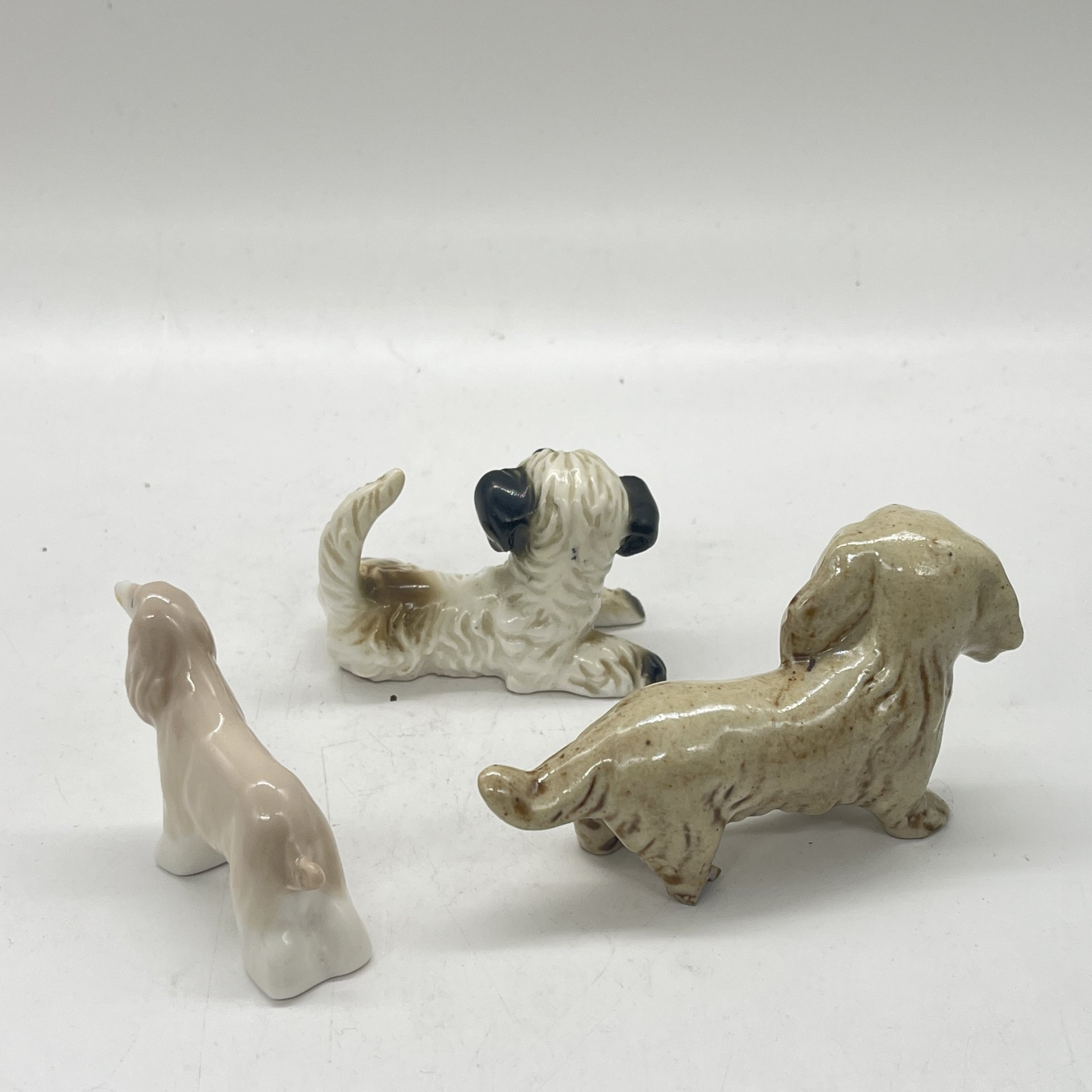 Набор из 3 статуэток собак в подборе, фарфор, роспись, Западная Европа, 1980-2000 гг.