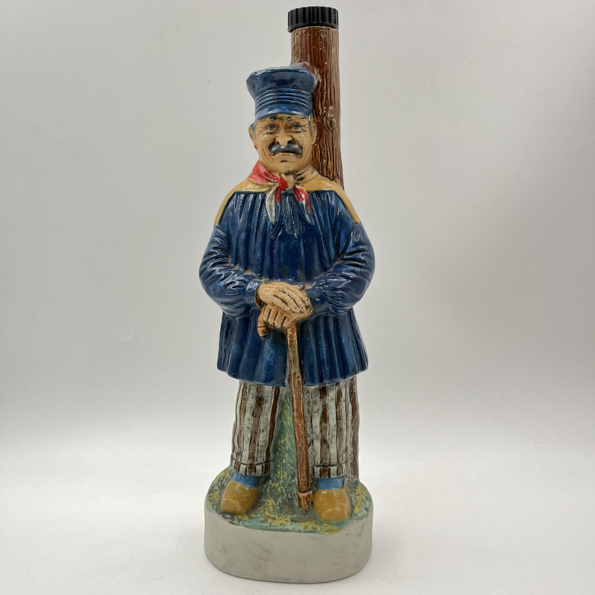 Штоф фигурный в виде мужчины в синем кафтане и фуражке, K.L.E.M., керамика, роспись, Италия, 1978 г.