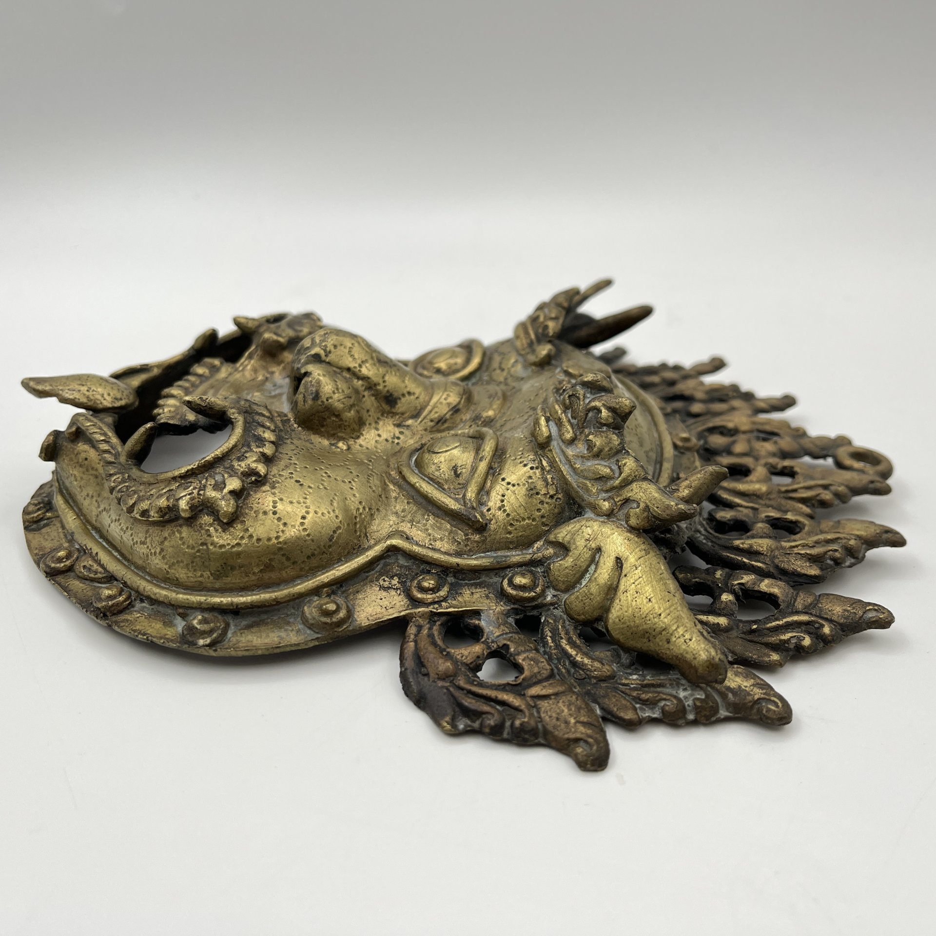 Настенный декор-маска "Махакала" (божество в буддизме, охранник и защитник учения Будды), металл, литье, Азия, 1970-1990 гг.