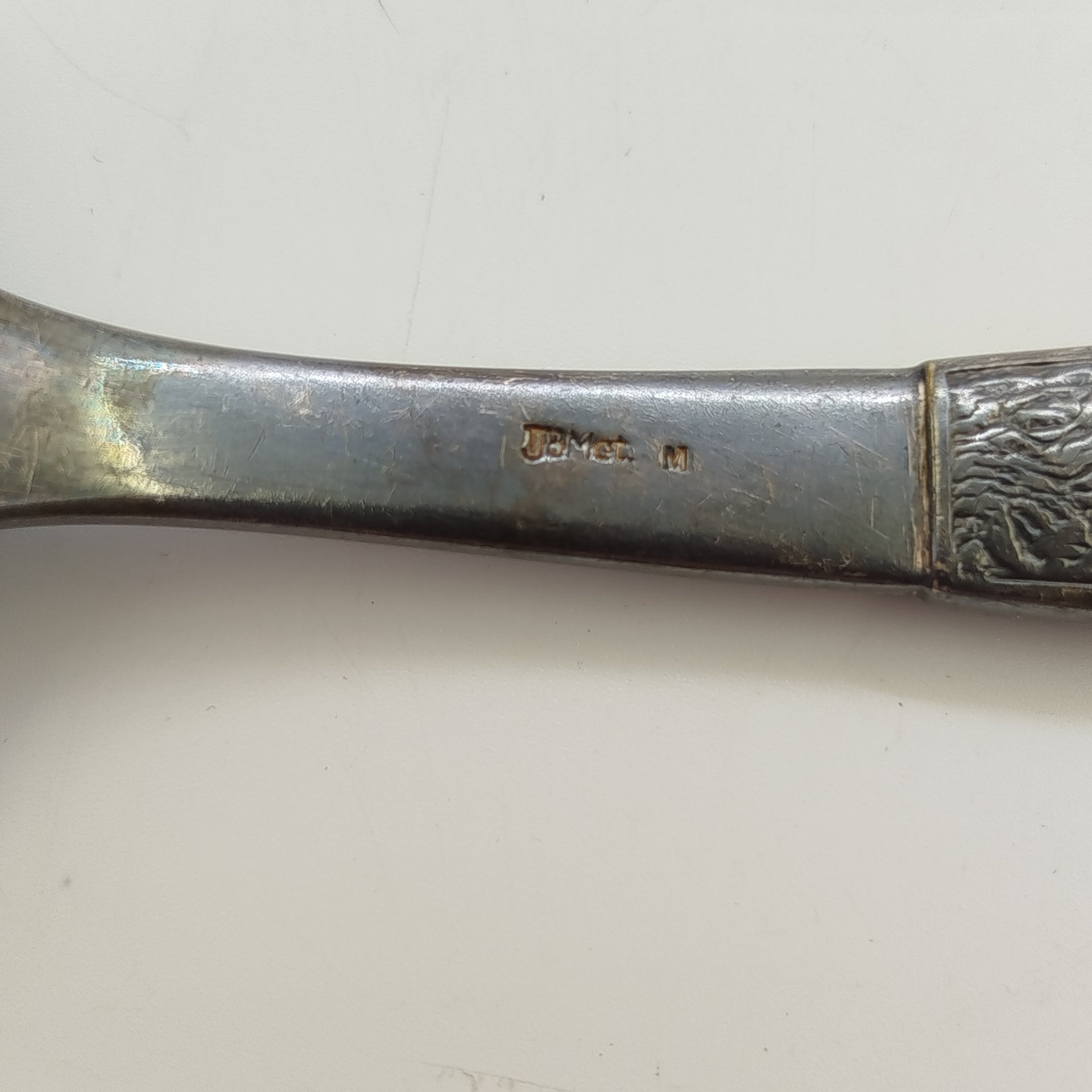 Ложка салатная с рельефным декором на ручке