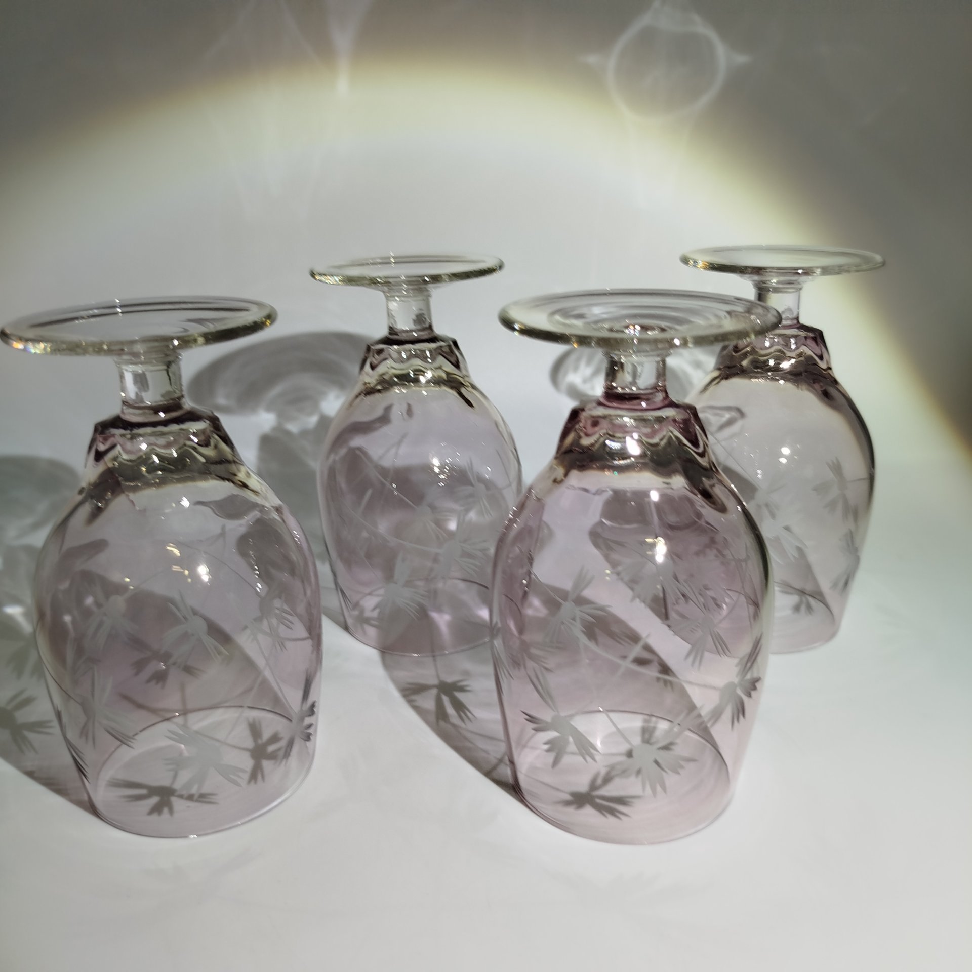 Набор из четырех бокалов розоватого оттенка с растительным декором (для крепких напитков), стекло, алмазная грань, СССР, 1970-1990 гг.
