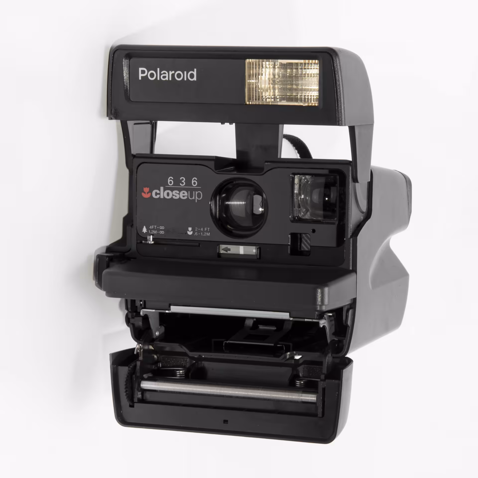 Фотоаппарат мгновенной печати "Polaroid 636 Close Up" в оригинальной коробке с инструкцией, пластмасса, Великобритания, 1980-1990 гг.