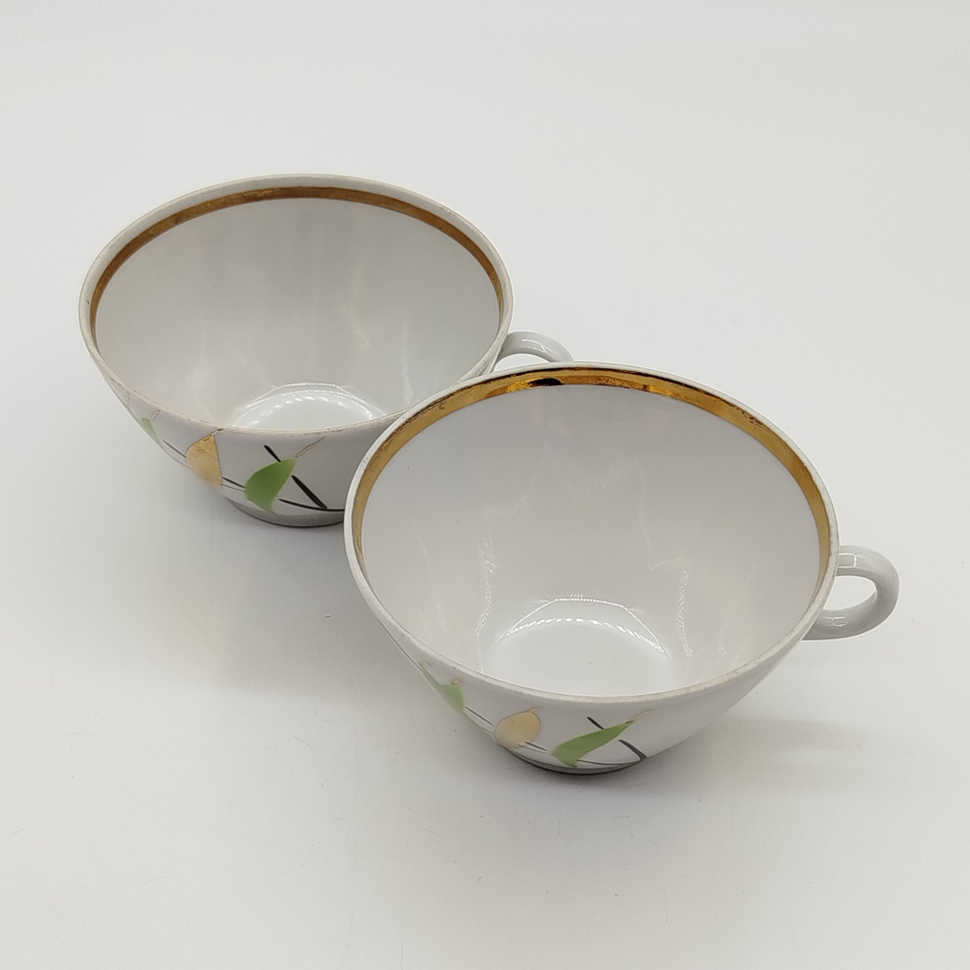 Пара чашек из сервиза "Ивушка", форма "Колечко", автор росписи В.К. Яснецов