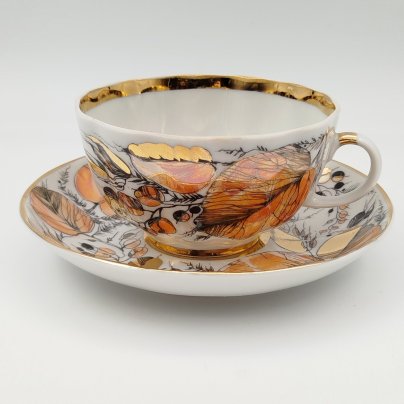 Пара чайная из сервиза "Золотая осень", форма "Тюльпан", автор формы С.Е. Яковлева, автор росписи Н.П. Славина, фарфор, деколь, люстр, золочение, Ленинградский фарфоровый завод (ЛФЗ), СССР, 1970-1986 гг.