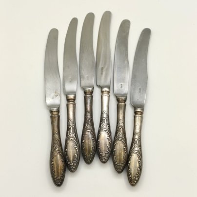 Набор из 6-ти десертных ножей с растительным декором (в подборе), мНЦ (медь-никель-цинк), нержавеющая сталь, Кольчугинский завод цветных металлов, СССР, 1960-1990 гг.