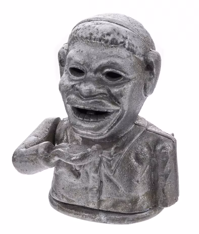 Копилка "Африканец ест монеты", металл, Европа, 1960-1970 гг.