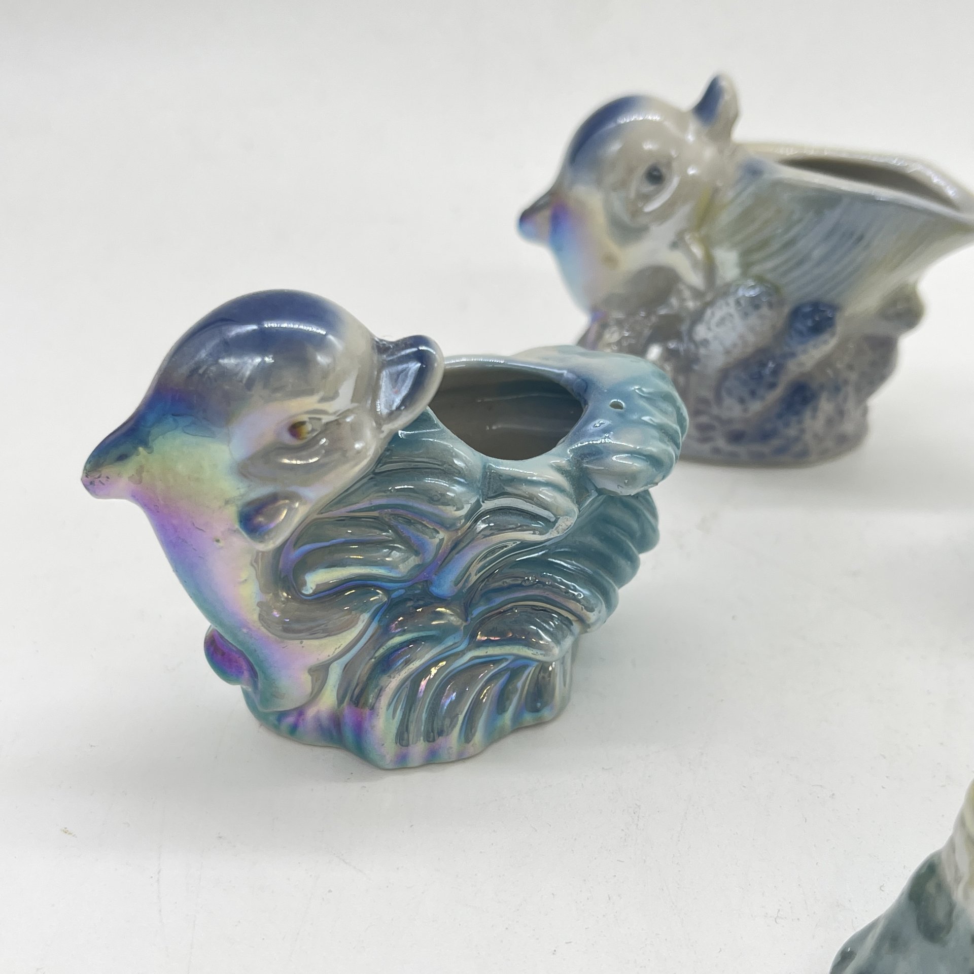 Набор из 4 статуэток "Дельфинчики" с морскими атрибутами, керамика, люстр, аэрограф, Россия, 1990-2010 гг.