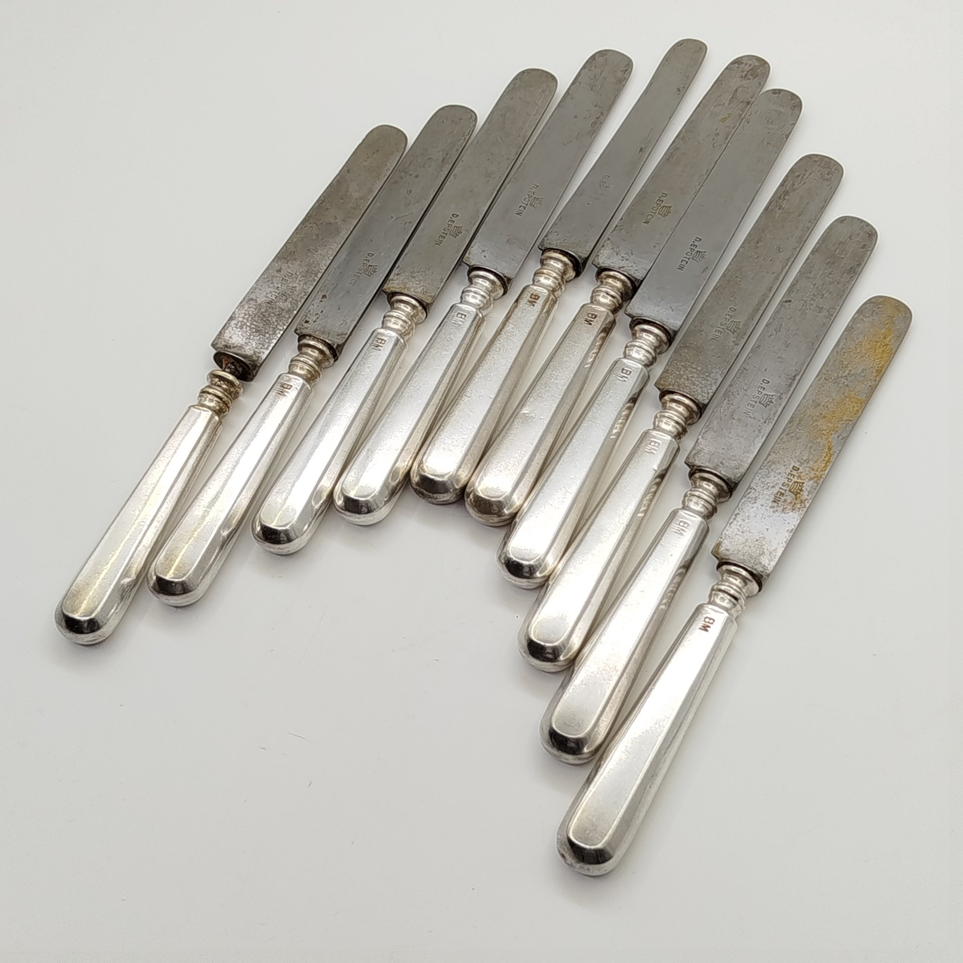 Набор из десяти десертных (закусочных) ножей, клеймо "D. Epstein"