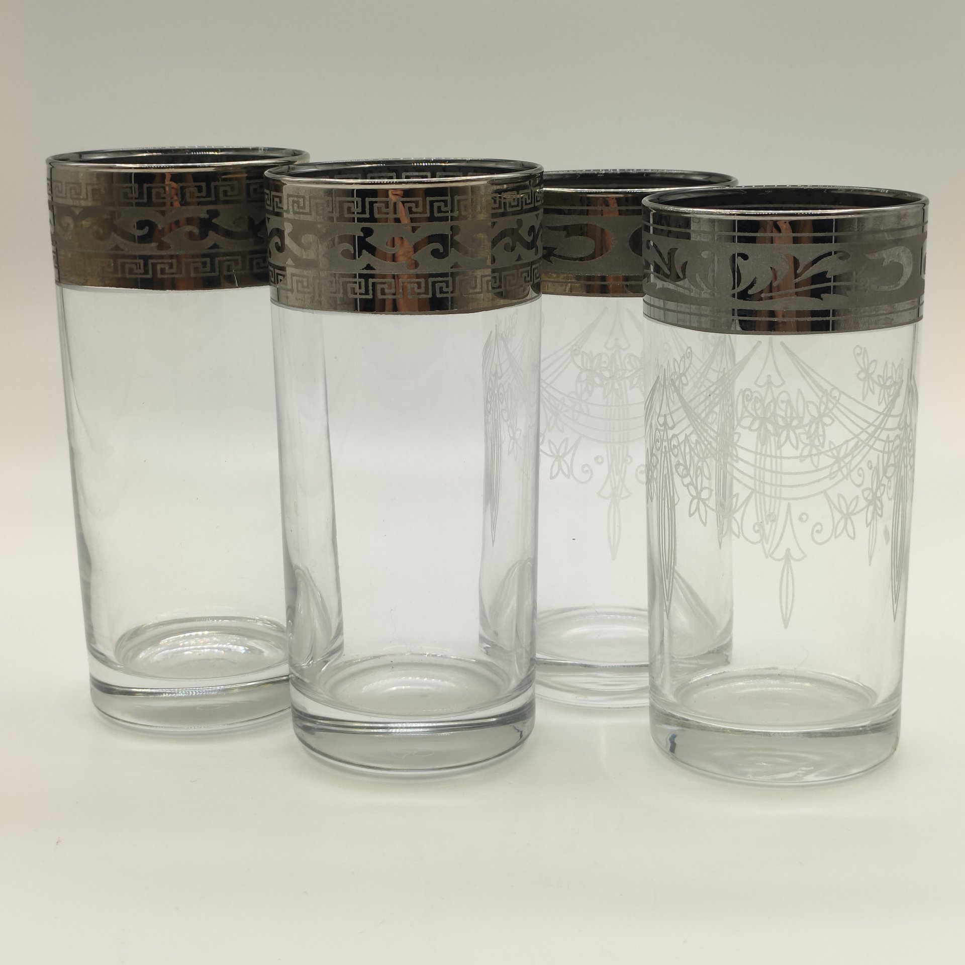 Набор из 4-х стаканов с орнаментальным декором на ободках (в подборе)