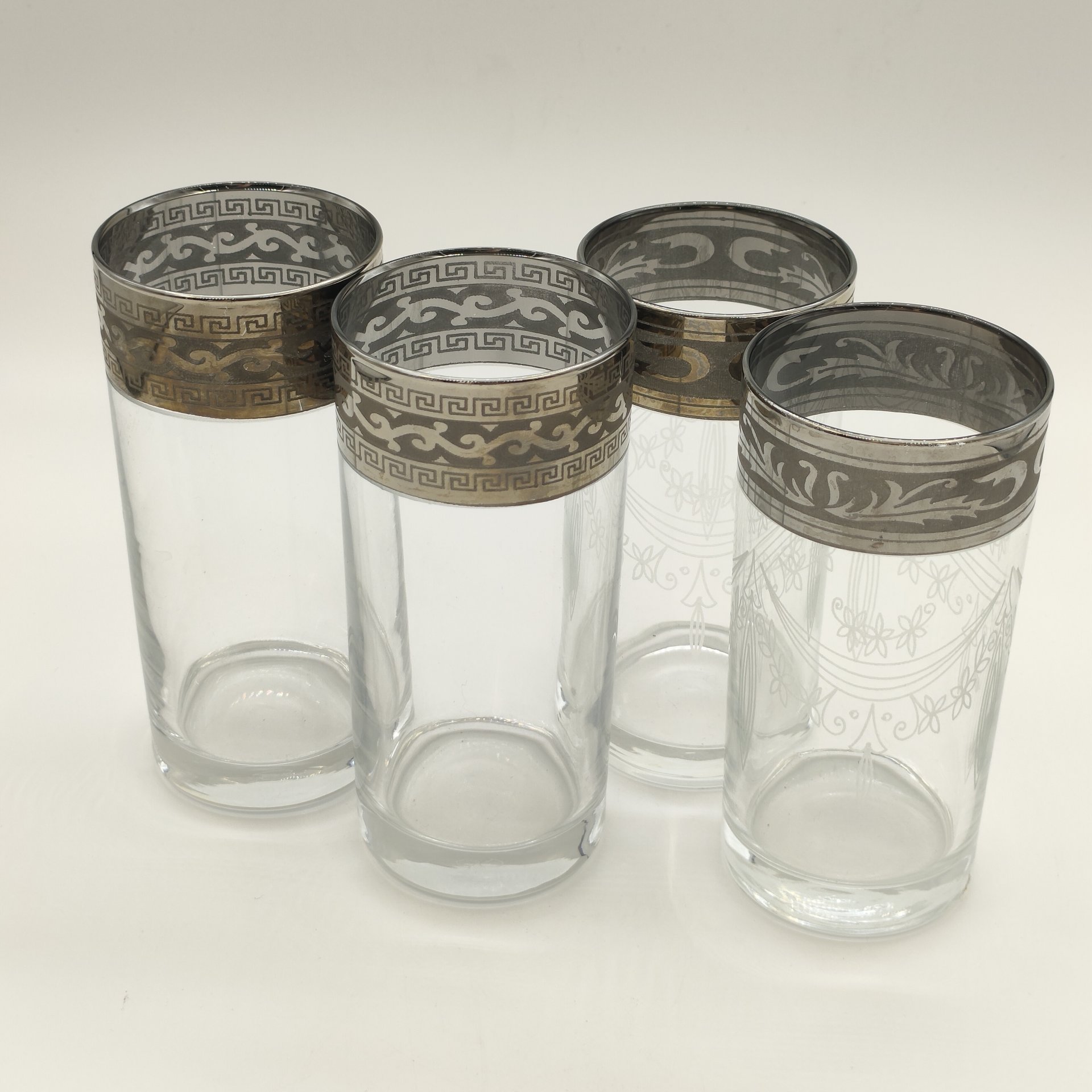 Набор из 4-х стаканов с орнаментальным декором на ободках (в подборе)