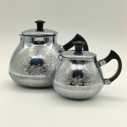 Набор из кофейника и молочника с рельефным цветочным декором, Калининградский машиностроительный завод