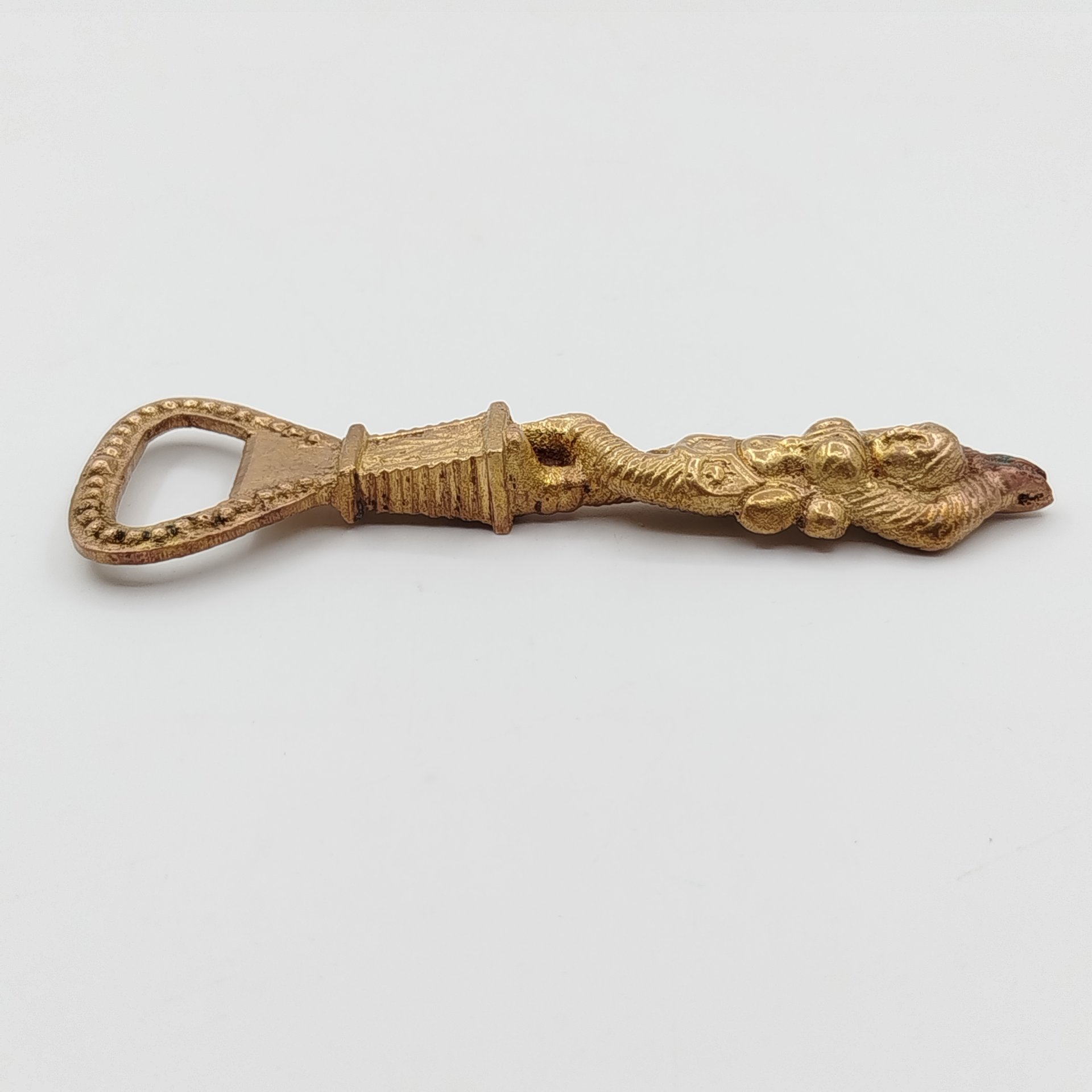 Открывалка с навершием в виде индийской девушки (божества)
