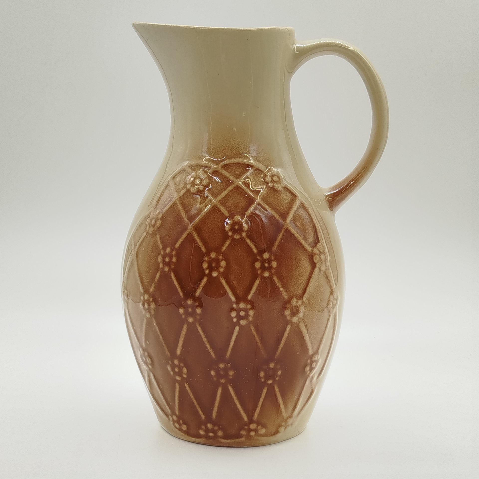 Кувшин с рельефным цветочным декором, фаянс, поливы, Ленинградский завод «Стройфаянс», СССР, 1972-1982 гг.