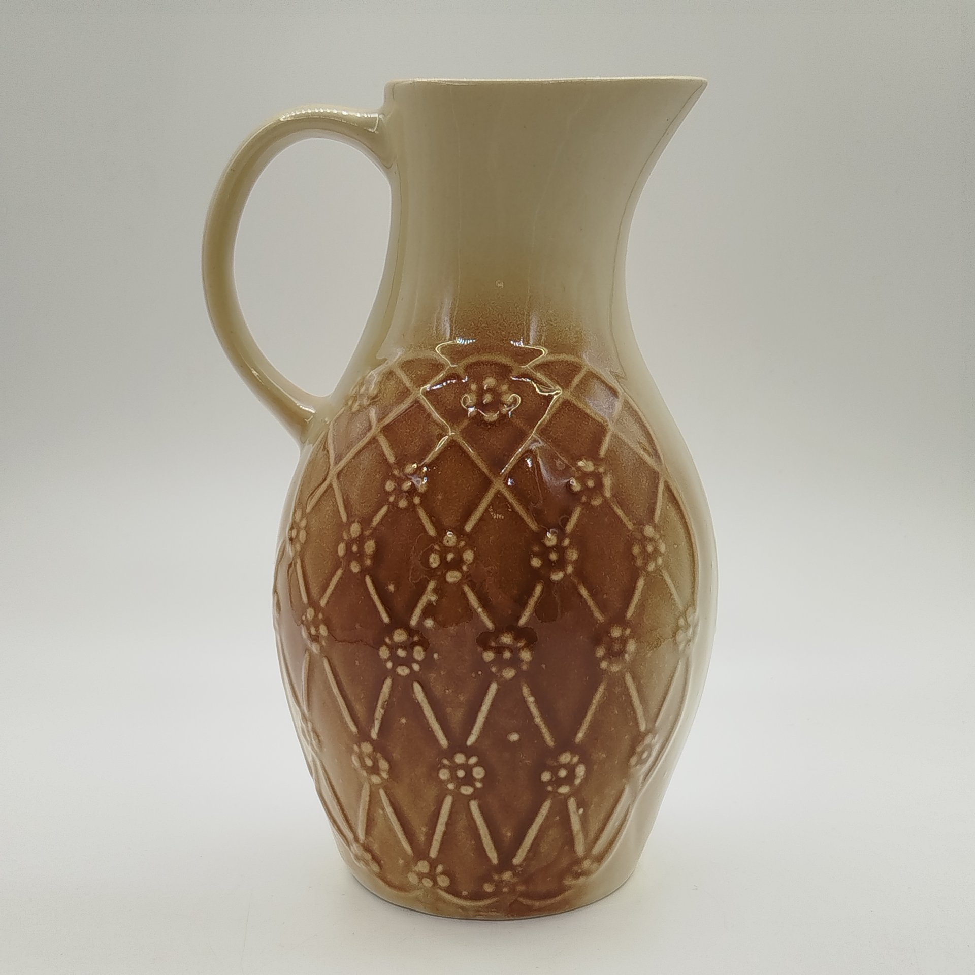 Кувшин с рельефным цветочным декором, фаянс, поливы, Ленинградский завод «Стройфаянс», СССР, 1972-1982 гг.