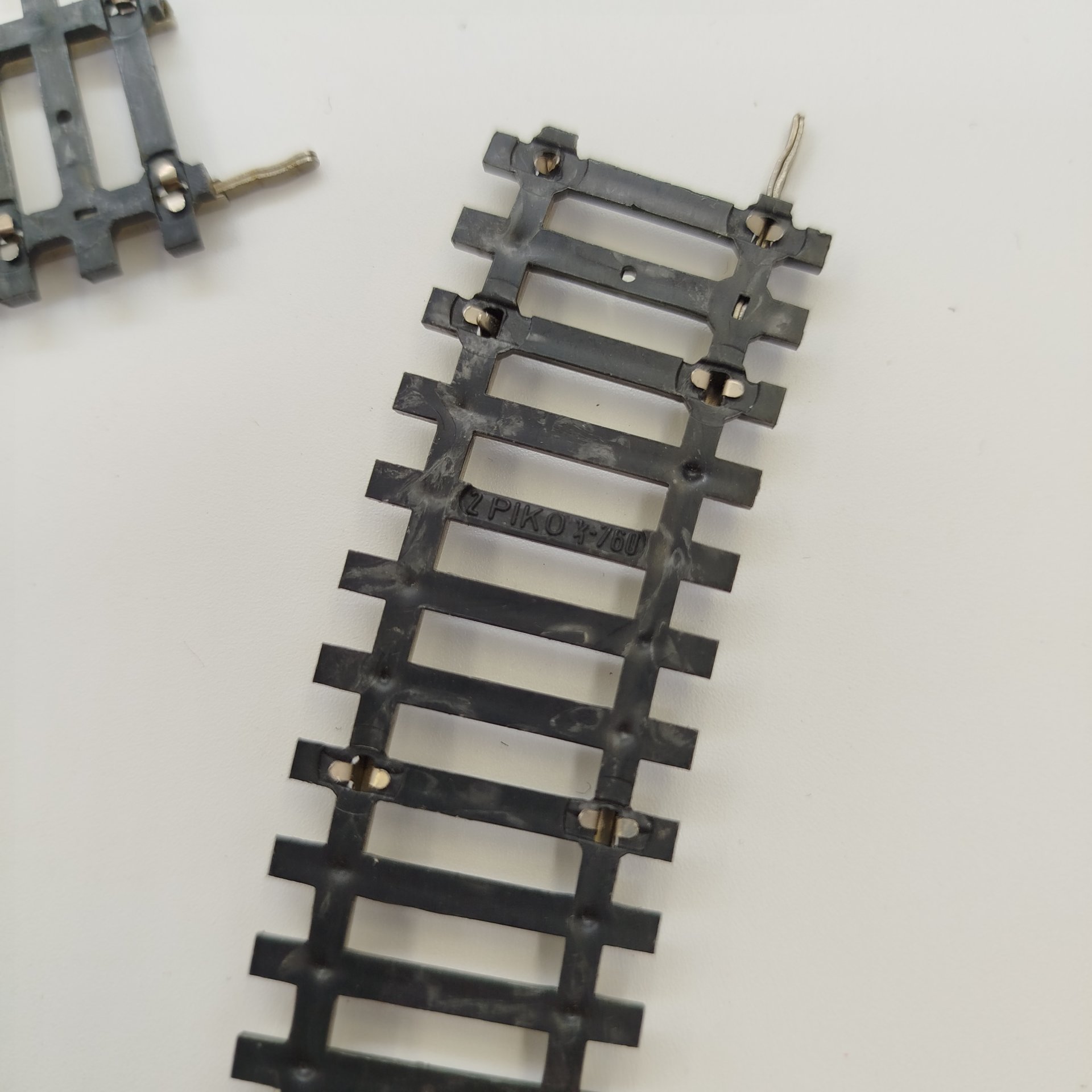 Набор из девяти рельс для железной дороги 9 мм, пластик, металл, Piko, ГДР, 1970-1980 гг.