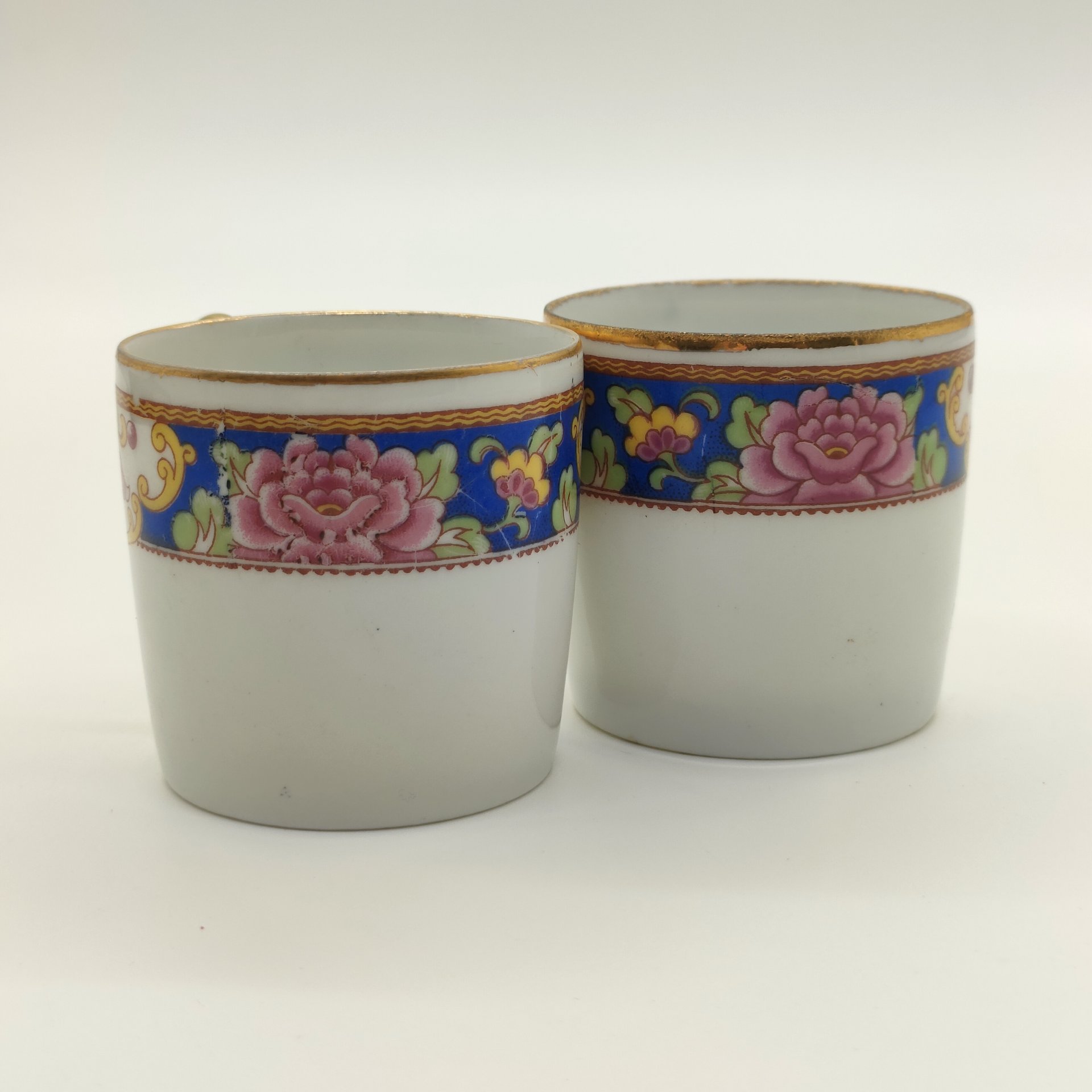 Пара кофейных чашек, украшенных растительным декором, форма "Литрон", Limoges Elte', фарфор, деколь, золочение, Франция, 1920-1940 гг.