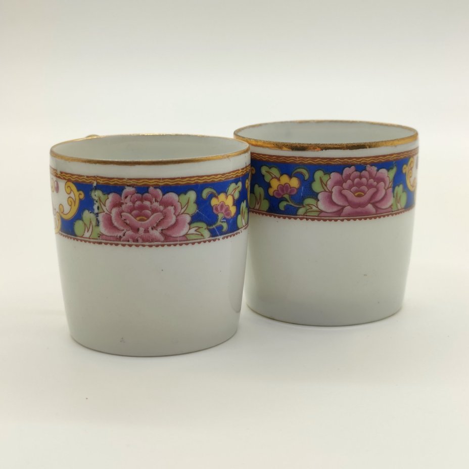 Пара кофейных чашек, украшенных растительным декором, форма "Литрон", Limoges Elte'