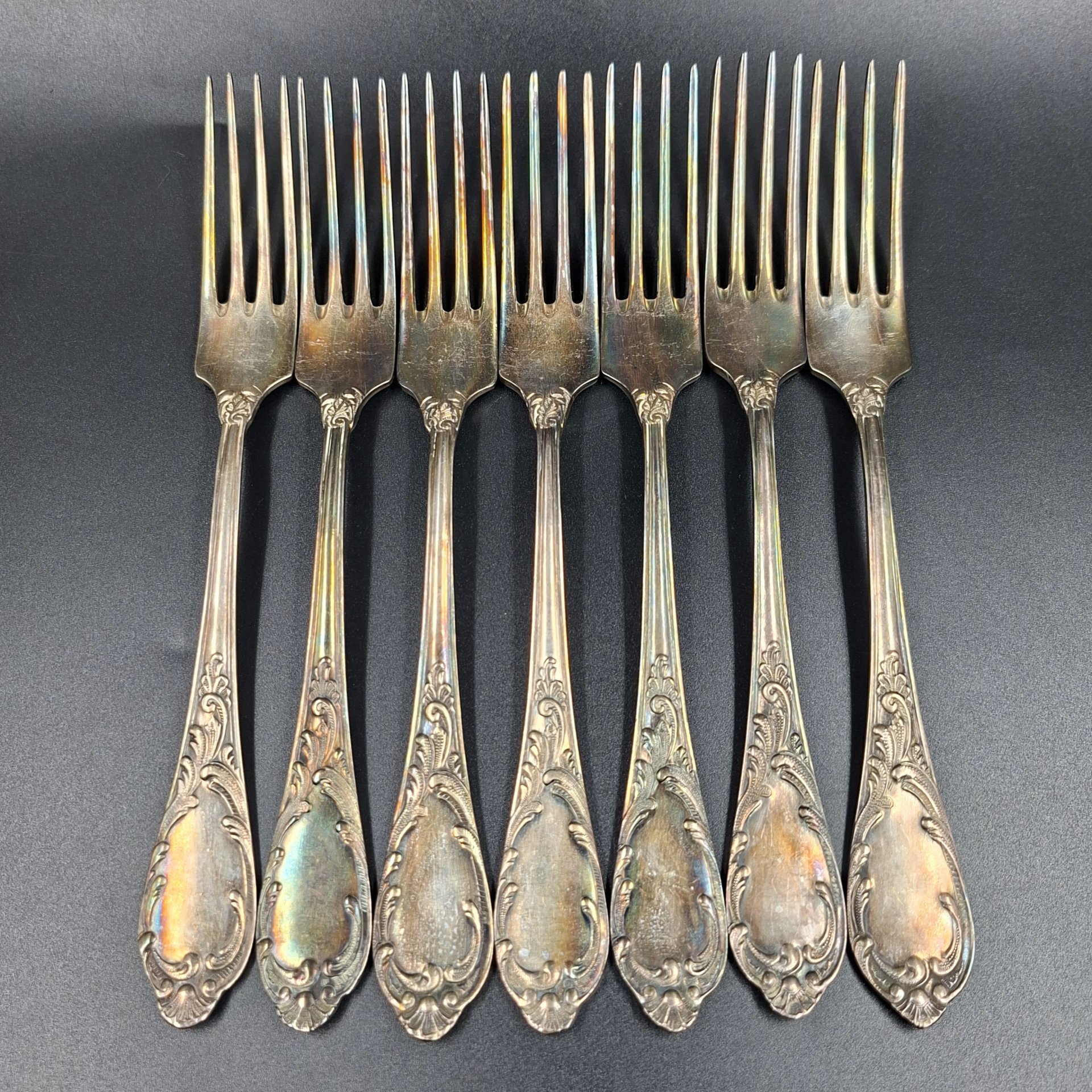 Набор из семи вилок с растительным декором, мНЦ (медь-никель-цинк), Вольнянский завод столовых приборов им. Шевченко (ЗiШ, ЗиШ), СССР, 1960-1980 гг.