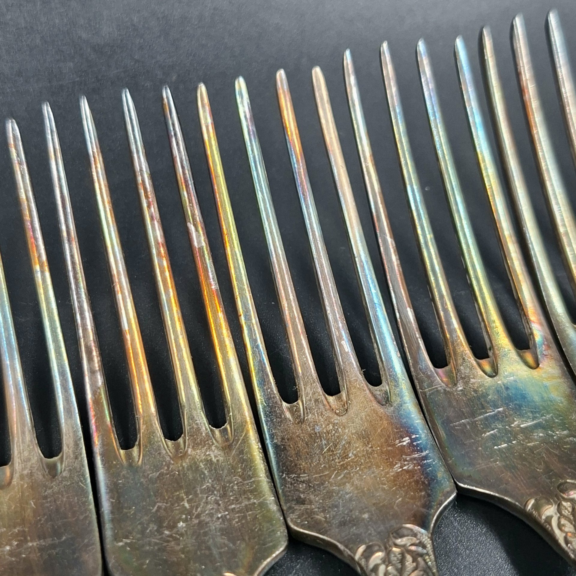 Набор из семи вилок с растительным декором, мНЦ (медь-никель-цинк), Вольнянский завод столовых приборов им. Шевченко (ЗiШ, ЗиШ), СССР, 1960-1980 гг.