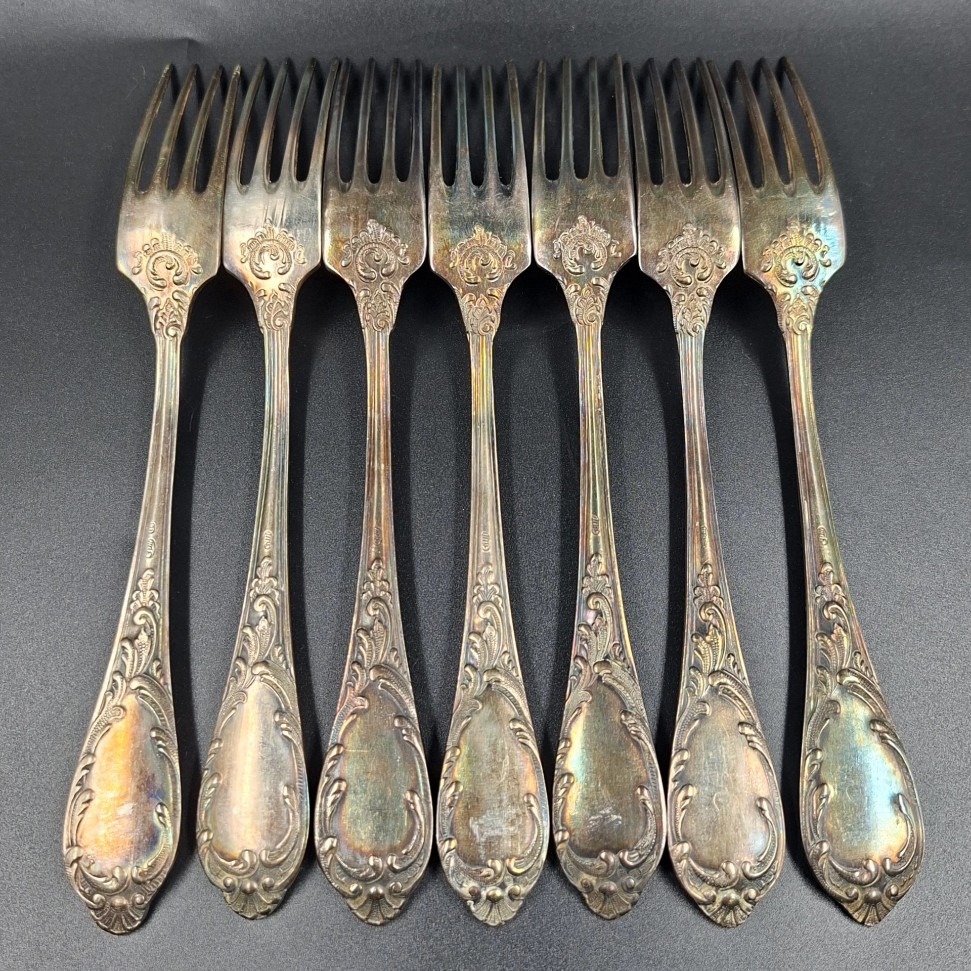 Набор из семи вилок с растительным декором, мНЦ (медь-никель-цинк), Вольнянский завод столовых приборов им. Шевченко (ЗiШ, ЗиШ), СССР, 1960-1980 гг.