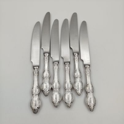 Набор из 6-ти столовых ножей, украшенных растительным декором, мНЦ (медь-никель-цинк), нержавеющая сталь, СССР, 1980-1991 гг.