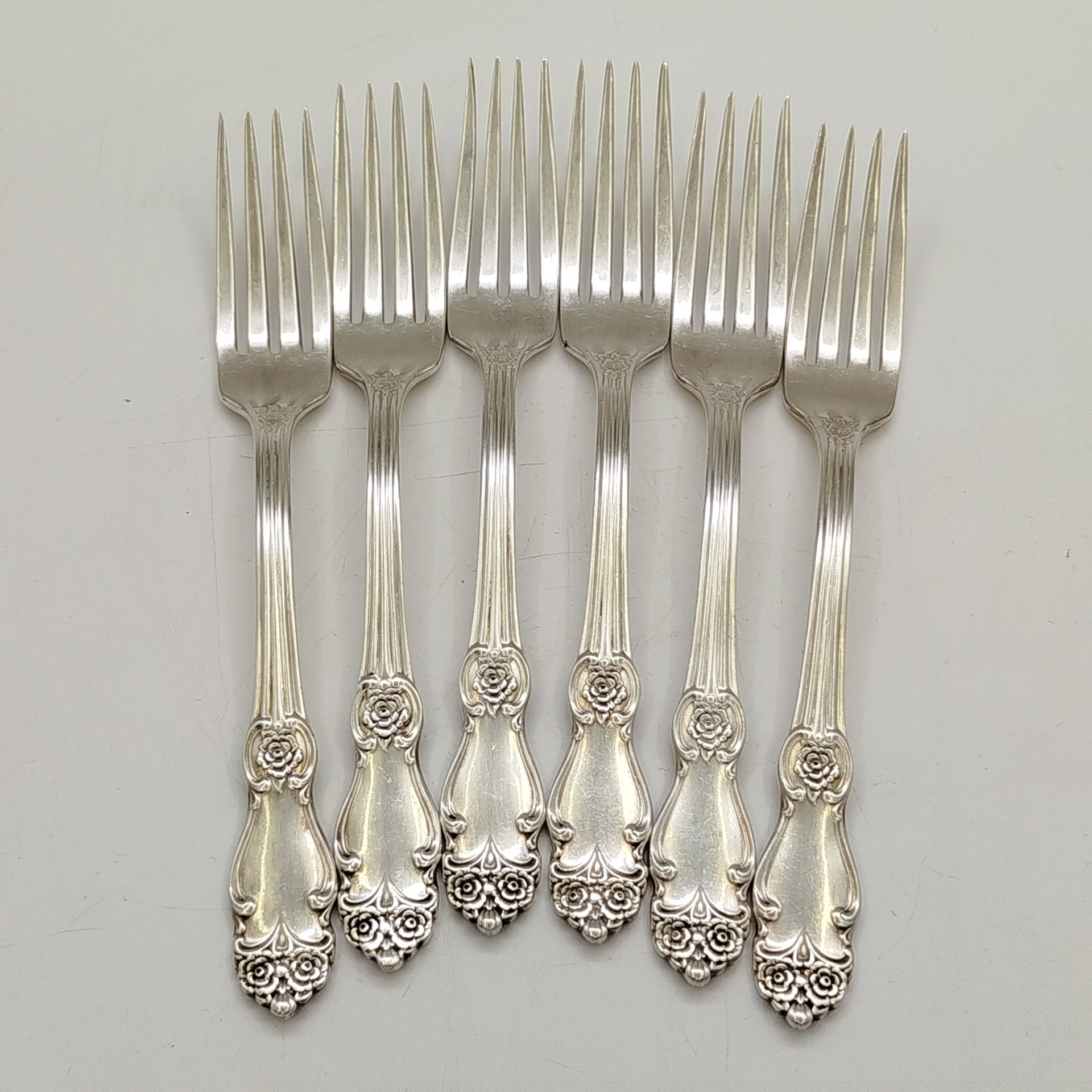 Набор из шести десертных вилок "Серебряная роза", мНЦ (медь-никель-цинк), Кольчугинский завод цветных металлов, СССР, 1970-1990 гг.