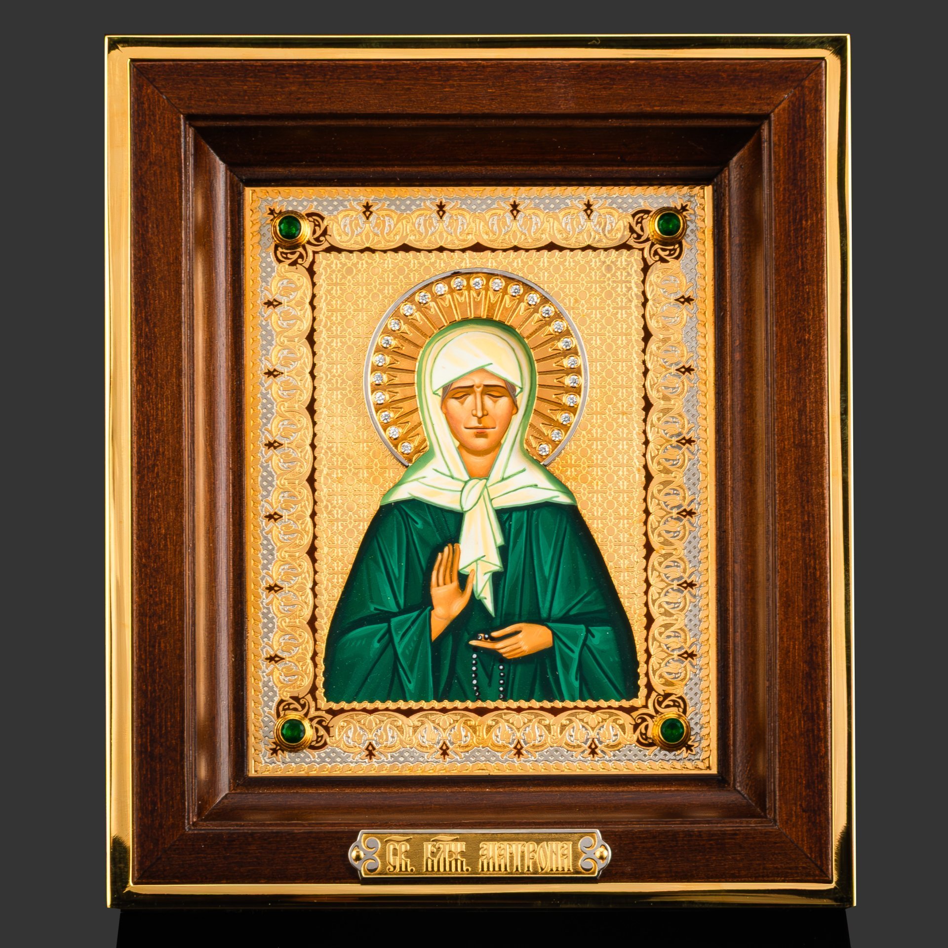 Икона "Святая Матрона Московская", латунь, золочение, никелирование, серебрение, чернение; левкас, темпера, латунь, зеленый кварц; в подарочном футляре из дерева с шелковым ложементом, Российская Федерация, 2024 г.