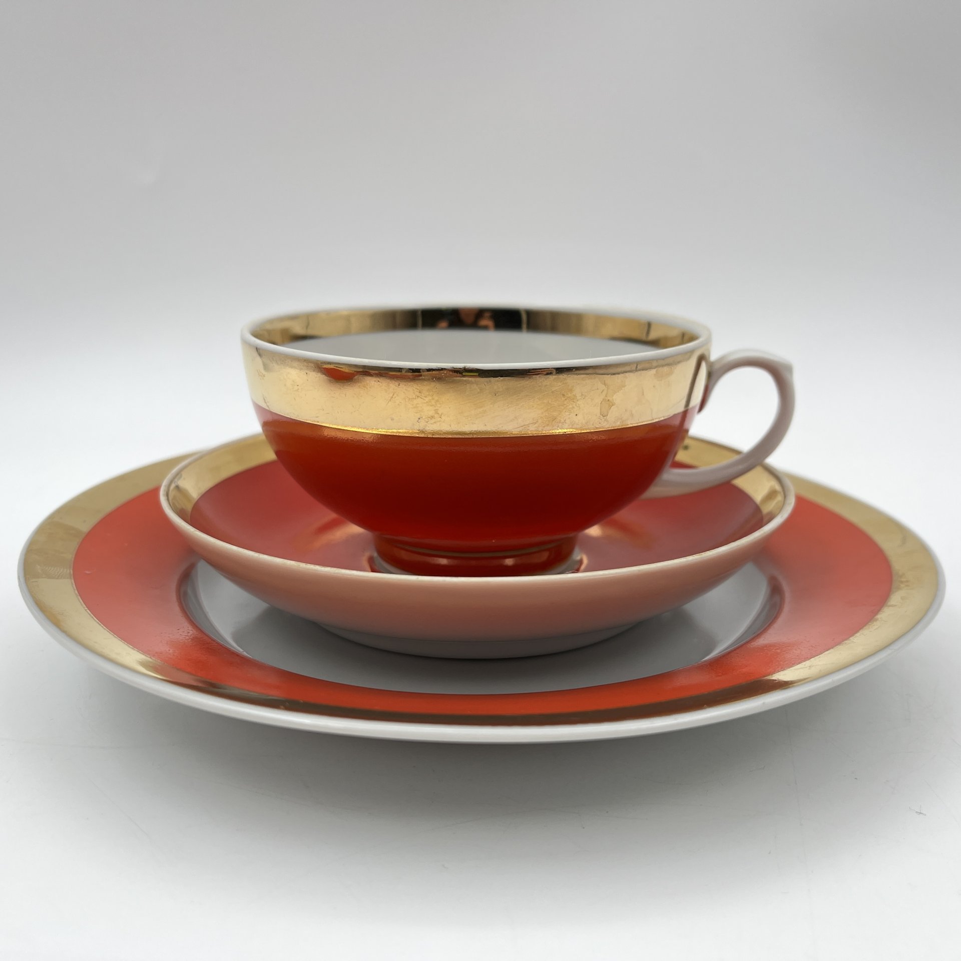 Набор чайных трио ярко оранжевого цвета на 5 персон, форма "Рубин", фарфор, крытье, золочение, Дулевский фарфоровый завод (Дулёво), СССР, 1968-1991 гг.