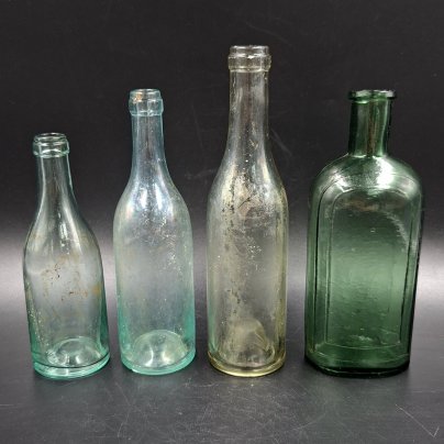 Набор из 4-х флаконов (бутылочек) различных форм и размеров, стекло, Европа, 1900-1940 гг.