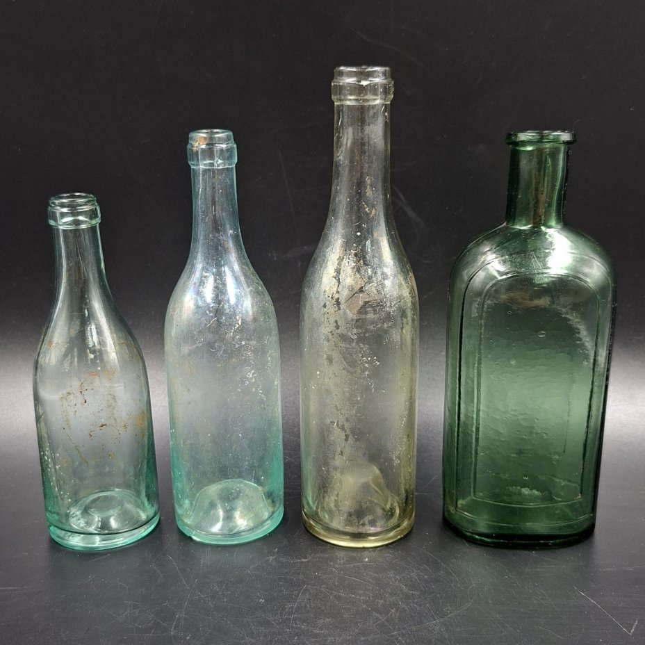 Набор из 4-х флаконов (бутылочек) различных форм и размеров, стекло, Европа, 1900-1940 гг.