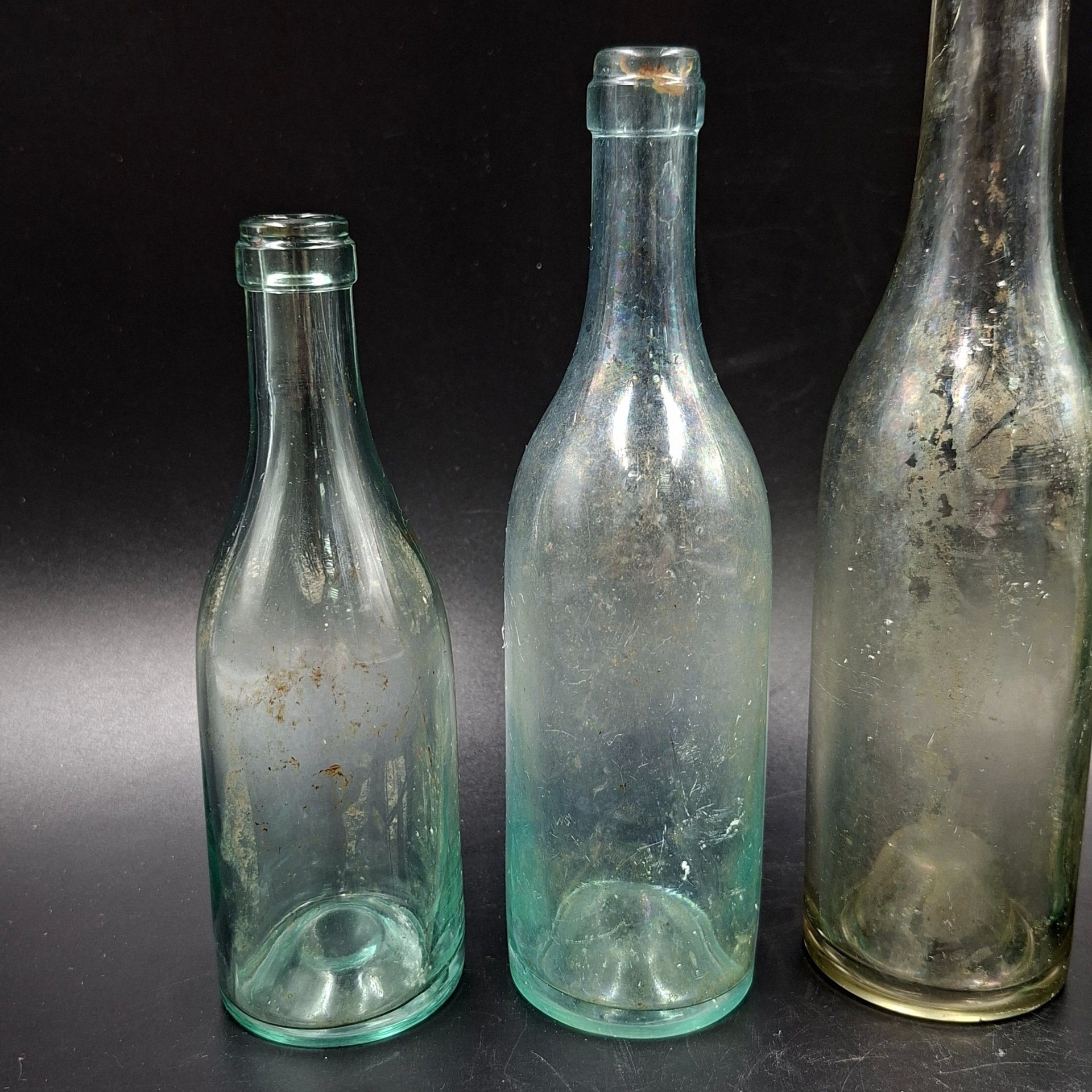 Набор из 4-х флаконов (бутылочек) различных форм и размеров, стекло, Европа, 1900-1940 гг.