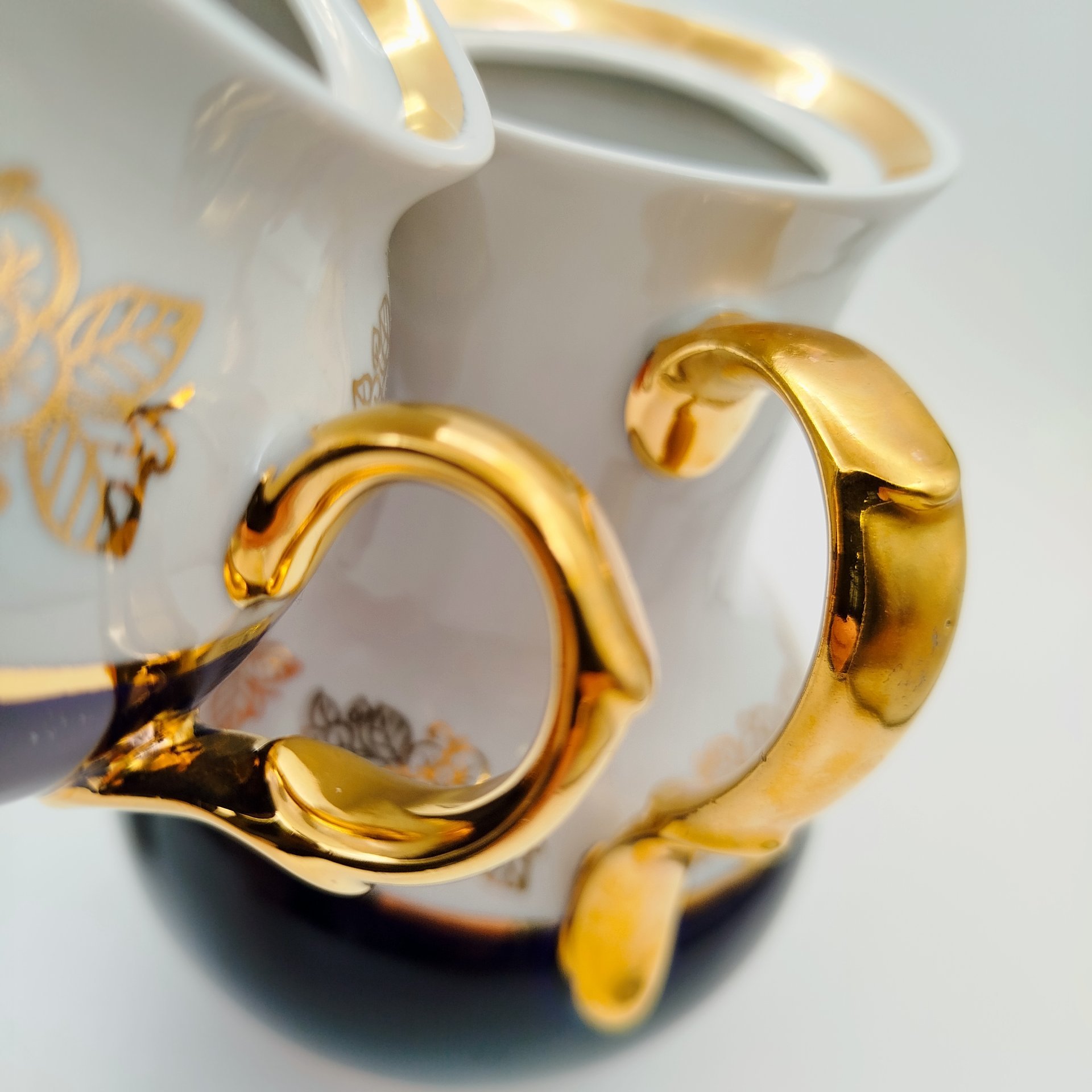 Сервиз кофейный на 6 персон (15 предметов), украшенный цветочнм декором, фарфор, крытье кобальтом, золочение, Полонский фарфоровый завод, СССР, 1980-1991 гг.