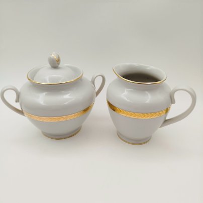 Набор из молочника и сахарницы белого цвета с декором в виде орнаментальных поясков, фарфор, золочение, Ленинградский фарфоровый завод (ЛФЗ), СССР, 1960-1970 гг.