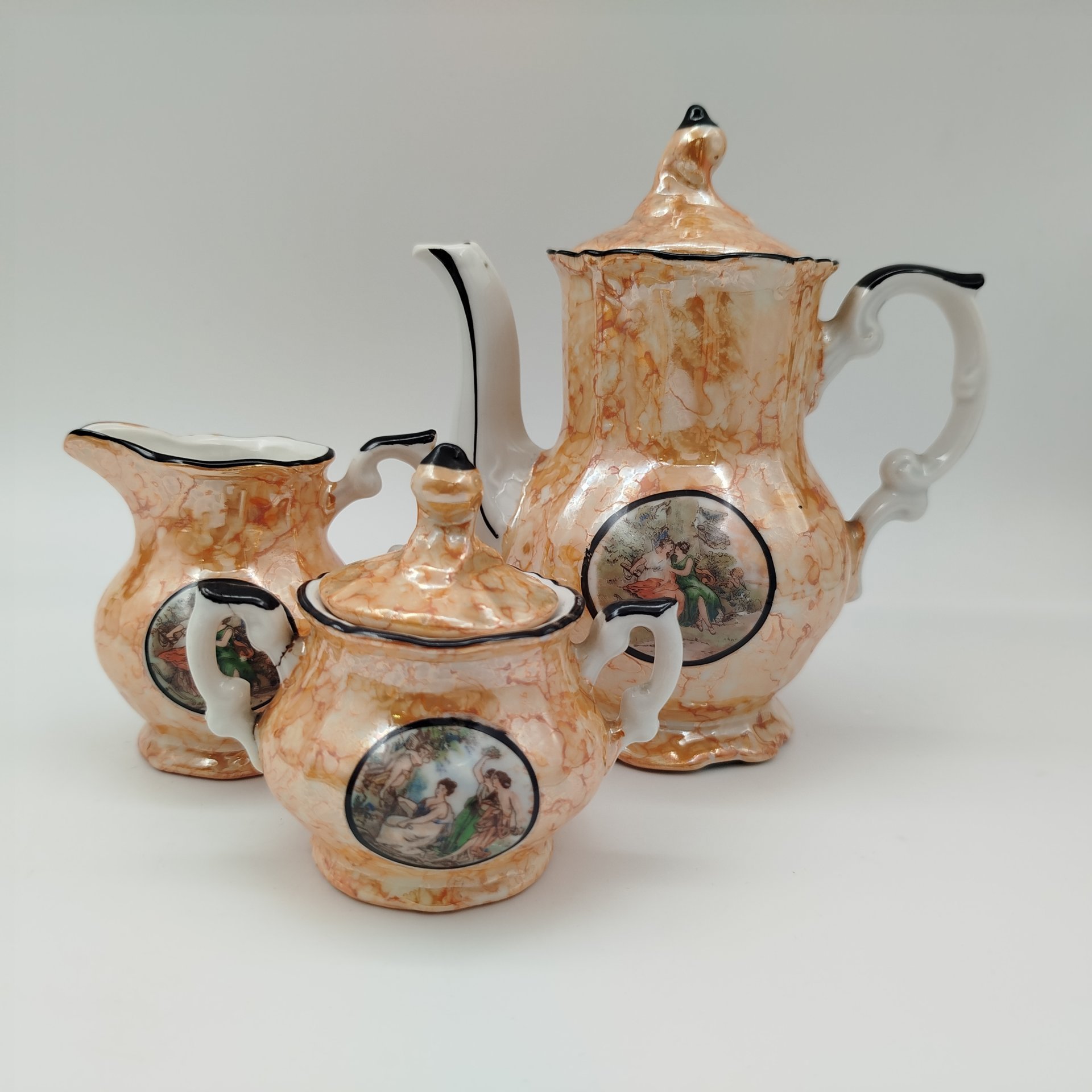 Сервиз кофейный "Мадонна" с разводами, на 4 персоны (11 предметов), фарфор, деколь, люстр, обводка, Европа, 1970-1990 гг.