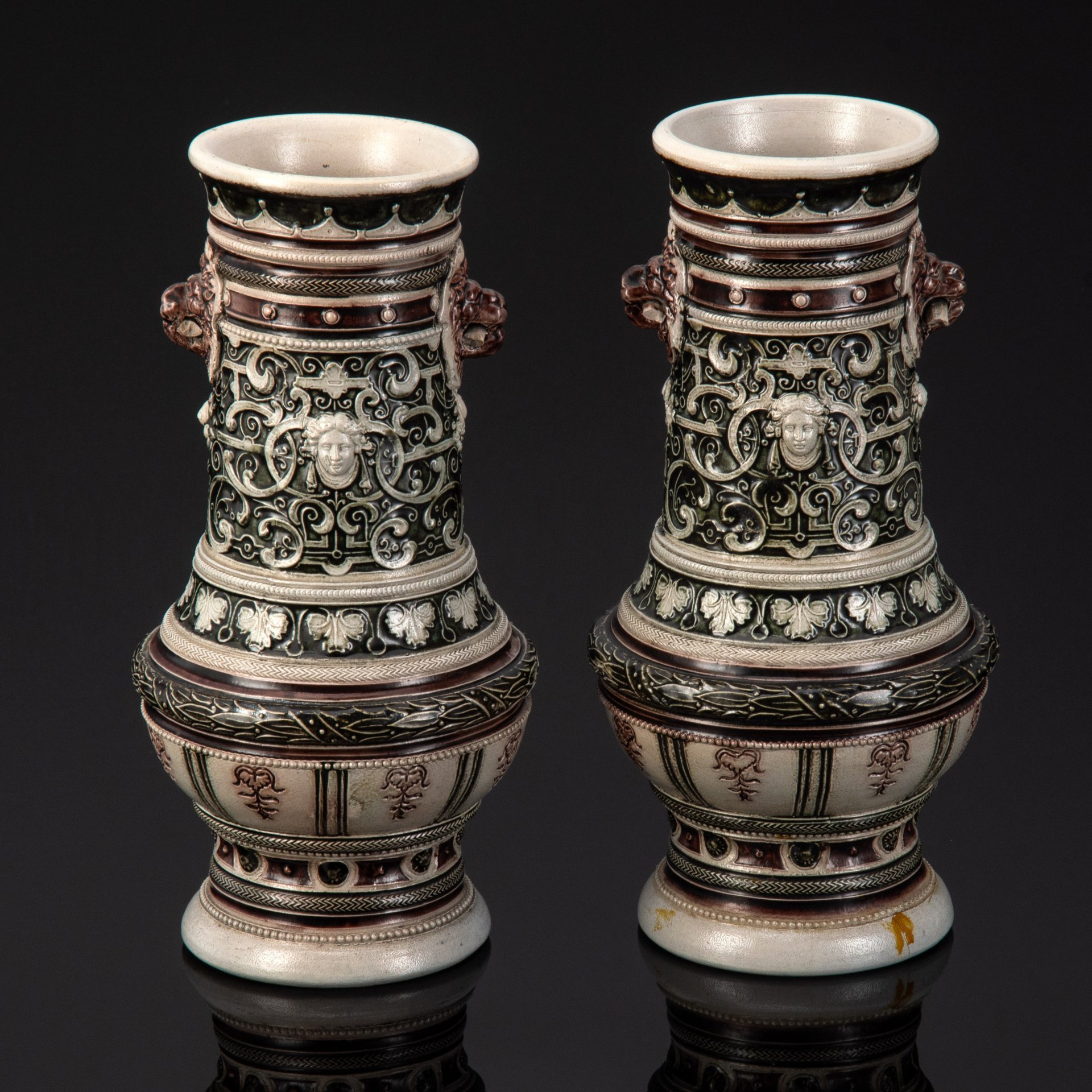 Вазы парные в стиле неоренессанс с растительным декором и маскаронами в виде человеческих и львиных голов, керамика, соляная глазурь, Германия, 1880-1920 гг.