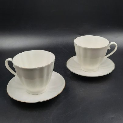 Набор из двух чайных пар "Золотой кантик", форма "Гвоздика", фарфор, золочение, Ленинградский фарфоровый завод (ЛФЗ), СССР, 1989-1992 гг.