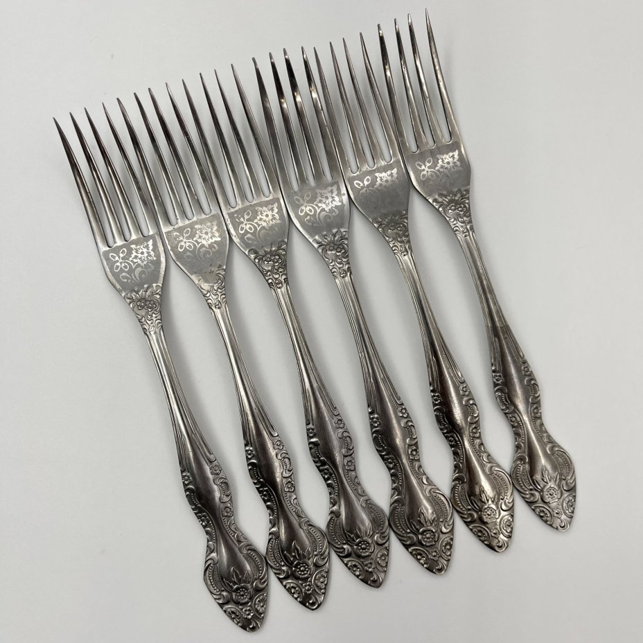 Набор из 6 столовых вилок, украшенных флоральным декором, нержавеющая сталь, Павловский завод художественных металлоизделий им. С.М. Кирова, СССР, 1973-1990 гг.