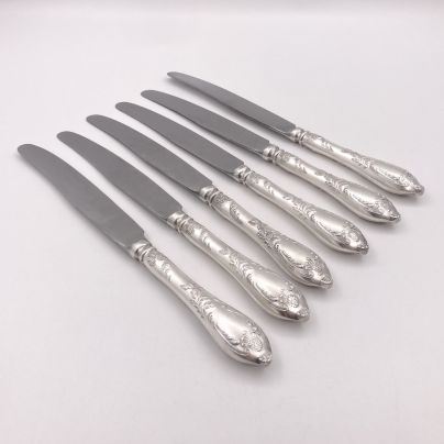 Набор столовых ножей на 6 персон, украшенных растительными мотивами, мНЦ (медь-никель-цинк), нержавеющая сталь, Вольнянский завод столовых приборов им. Шевченко (ЗiШ, ЗиШ), СССР, 1970-1990 гг.