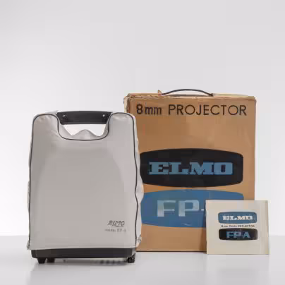 Кинопроектор "Elmo model FP-A" с объективом "Elmo zoom F: 1.3"